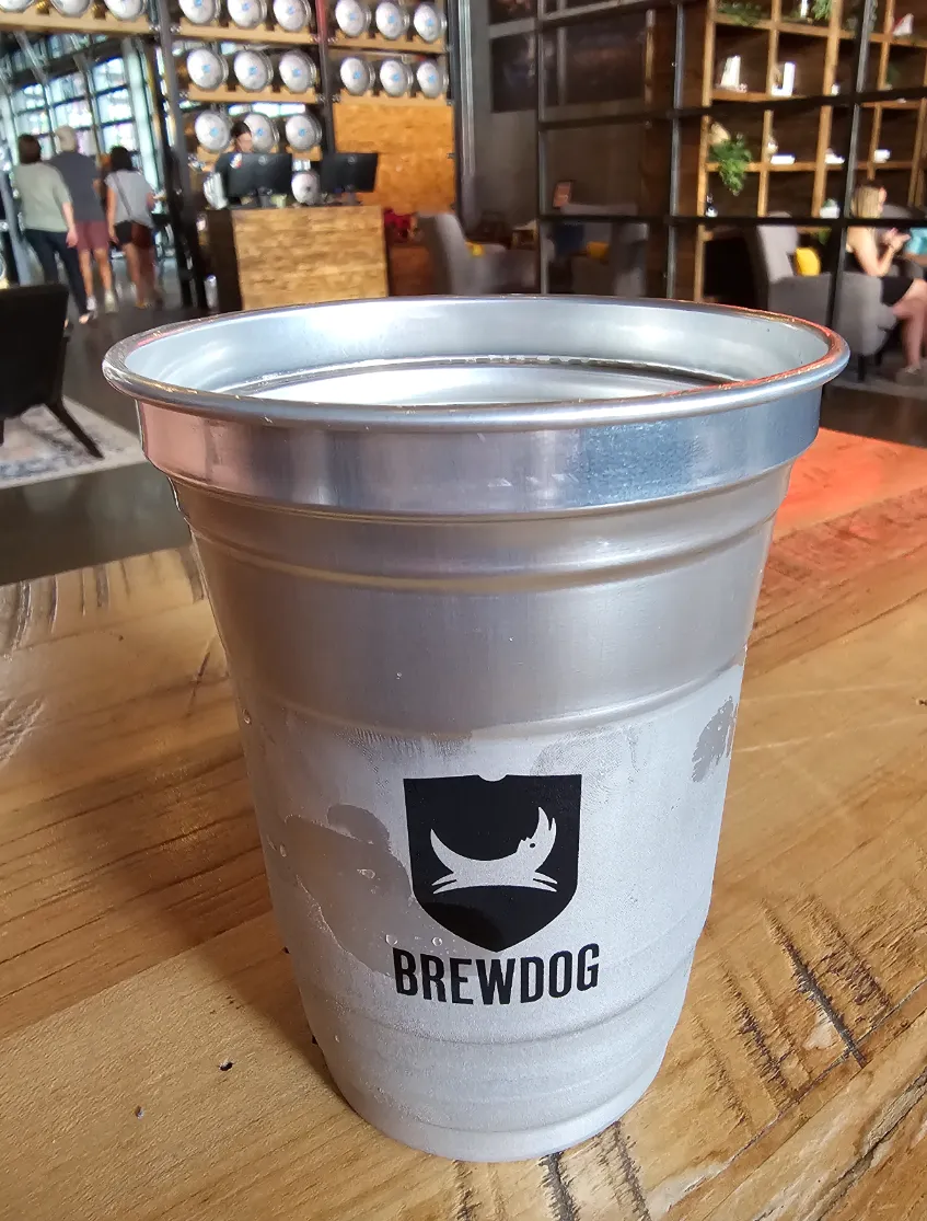 Many of the beers served in an aluminum cup.